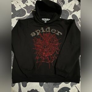 Black Sp5der OG Red Rhinestone Logo Hoodie
Size XL